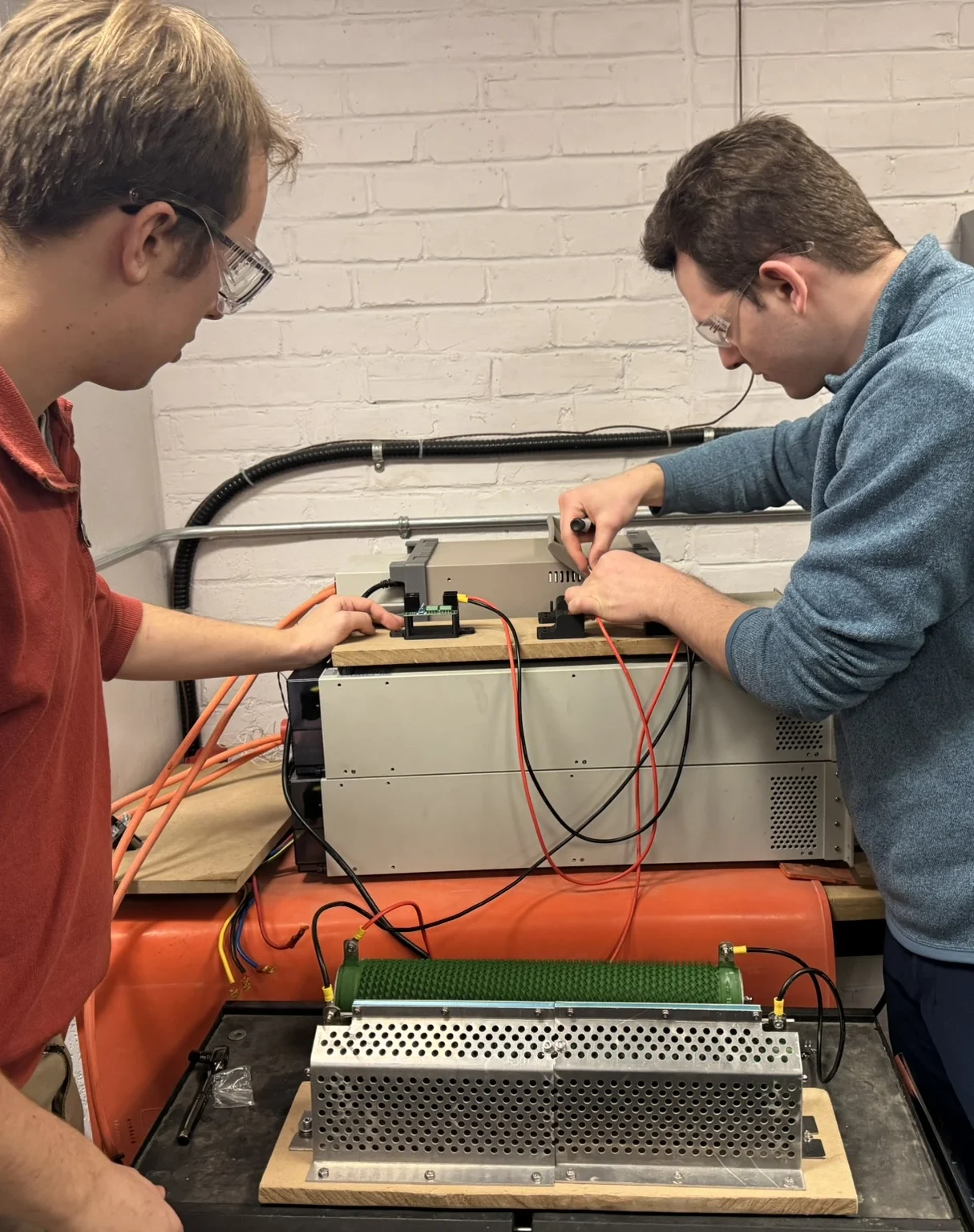 Nick and Ethan working at the PN Labs workbench